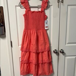 Women’s tired dress, size medium.
